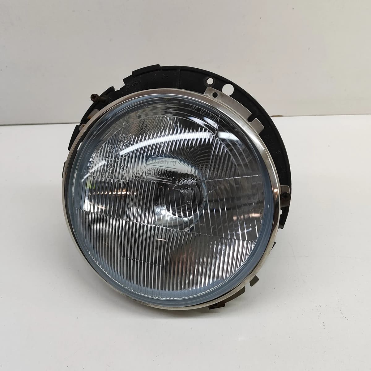 LAND ROVER DEFENDER L315 Front Left Headlight STC7644 2.5D 1998 RHD 27337134